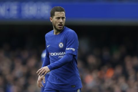 Chelsea's Eden Hazard waits for a free kick to be taken during their English Premier League soccer match between Chelsea and Tottenham Hotspur at Stamford Bridge stadium in London, Sunday, April, 1, 2018. (AP Photo/Alastair Grant)