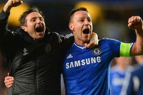 LONDON, ENGLAND - APRIL 08: Frank Lampard and John Terry of Chelsea celebrate victory during the UEFA Champions League Quarter Final second leg match between Chelsea and Paris Saint-Germain FC at Stamford Bridge on April 8, 2014 in London, England.  (Photo by Mike Hewitt/Getty Images)