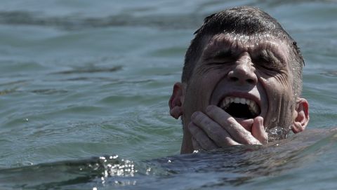 Greece's Spiros Gianniotis reacts after winning the silver medal in the men's marathon swimming competition of the 2016 Summer Olympics in Rio de Janeiro, Brazil, Tuesday, Aug. 16, 2016. (AP Photo/Gregory Bull)