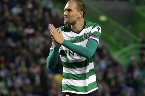 Sporting's Bas Dost gestures during the Europa League round of 32 second leg soccer match between Sporting CP and Astana at the Alvalade stadium in Lisbon, Thursday Feb. 22, 2018. (AP Photo/Armando Franca)