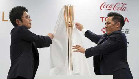 The Olympic torch of the Tokyo 2020 Olympic Games is unveiled during a press conference in Tokyo Wednesday, March 20, 2019. The torch is the centerpiece of attention in the months just before the Olympics open. The Tokyo Olympics open on July 24, 2020.(AP Photo/Eugene Hoshiko)