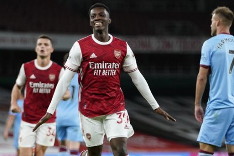 Arsenal's Eddie Nketiah celebrates scoring his side's second goal during the English Premier League soccer match between Arsenal and West Ham at the Emirates Stadium in London, England, Saturday, Sept. 19, 2020. (Will Oliver/Pool via AP)