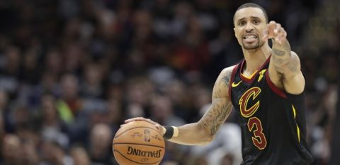Cleveland Cavaliers' George Hill drives against the Indiana Pacers in the first half of Game 1 of an NBA basketball first-round playoff series, Sunday, April 15, 2018, in Cleveland. (AP Photo/Tony Dejak)