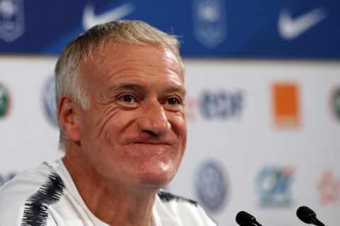 France's coach Didier Deschamps attends a press conference ahead of Tuesday's UEFA Nations League soccer match between France and Germany at State De France, in Saint Denis, north of Paris, France, Monday, Oct. 15, 2018. (AP Photo/Francois Mori)