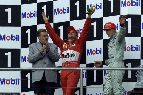 2000 German Grand Prix
Hockenheim, Germany
Rubens Barrichello looks to the sky and celebrates with Mika Hakkinen 
World Copyright: Steven Etherington/LAT Photographic
ref: Digital Image only