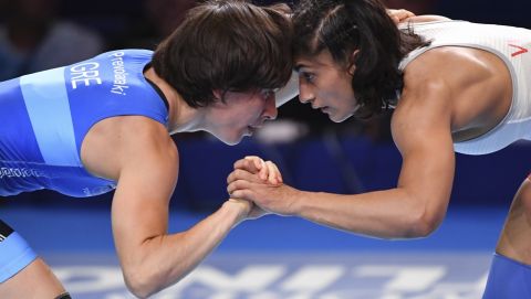 Vinesh Phogat of India, right, and Maria Prevolaraki of Greece compete at the bronze match of the women's 53kg category during the Wrestling World Championships in Nur-Sultan, Kazakhstan, Wednesday, Sept. 18, 2019. (AP Photo/Anvar Ilyasov)