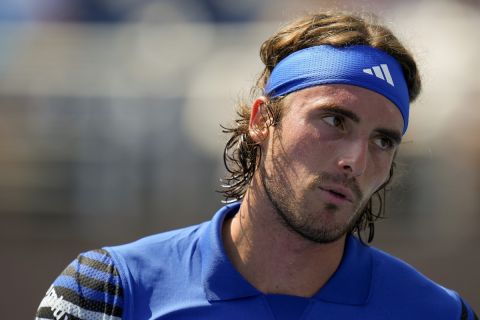 Stefanos Tsitsipas, of Greece, reacts during a match against Dominic Stricker, of Switzerland, during the second round of the U.S. Open tennis championships, Wednesday, Aug. 30, 2023, in New York. (AP Photo/Manu Fernandez)
