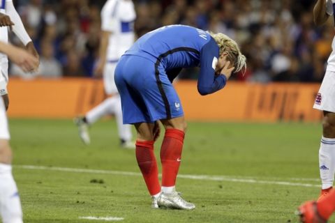 France's Antoine Griezmann reacts during the World Cup Group A qualifying soccer match between France and Luxembourg at the Stadium municipal in Toulouse, France, Sunday, Sept. 3, 2017. (AP Photo/Claude Paris)