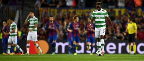 BARCELONA, SPAIN - SEPTEMBER 13: Moussa Dembele of Celtic looks dejected as Barcelona score their first goal during the UEFA Champions League Group C match between FC Barcelona and Celtic FC at Camp Nou on September 13, 2016 in Barcelona, Spain.  (Photo by David Ramos/Getty Images)