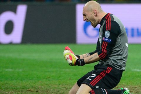 AC Milan's goalkeeper Chistian Abbiati  celebrates at the end of the Champions League football match between AC Milan and FC Barcelona on February 20, 2013 at San Siro Stadium in Milan. AC Milan defeated Barcelona 2-0.   AFP PHOTO / OLIVIER MORIN        (Photo credit should read OLIVIER MORIN/AFP/Getty Images)