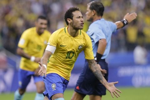 Brazil's Neymar celebrates scoring his side's 2nd goal against Paraguay during a 2018 World Cup qualifying soccer match at the Arena Corinthians Stadium in Sao Paulo, Brazil, Tuesday, March 28, 2017. (AP Photo/Nelson Antoine)
