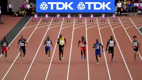 United States' Christian Coleman, third right, leads the field in his Men's 100 meters semifinal during the World Athletics Championships in London Saturday, Aug. 5, 2017. (AP Photo/Martin Meissner)