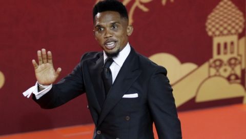 Former soccer player of Cameroon Samuel Eto'o arrives for the 2018 soccer World Cup draw in the Kremlin in Moscow, Friday, Dec. 1, 2017. (AP Photo/Dmitri Lovetsky)