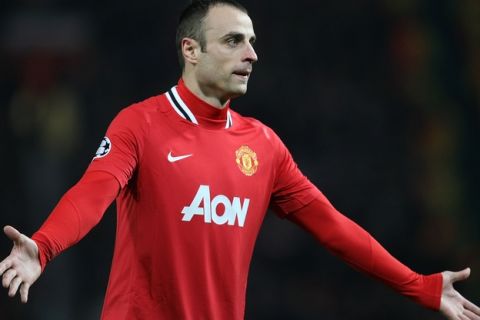 MANCHESTER, ENGLAND - NOVEMBER 22:  Dimitar Berbatov of Manchester United shows his frustration during the UEFA Champions League Group C match between Manchester United and Benfica at Old Trafford on November 22, 2011 in Manchester, England.  (Photo by John Peters/Man Utd via Getty Images)