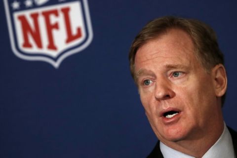 NFL commissioner Roger Goodell tells reporters the NFL team owners have reached agreement on a new league policy that requires players to stand for the national anthem or remain in the locker room during the NFL owner's spring meeting Wednesday, May 23, 2018, in Atlanta. (AP Photo/John Bazemore)