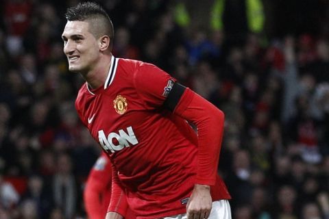 Manchester United's Federico Macheda reacts after scoring a penalty against Crystal Palace during their English League Cup soccer match at Old Trafford Stadium, Manchester, England, Wednesday Nov. 30, 2011. (AP Photo/Jon Super)