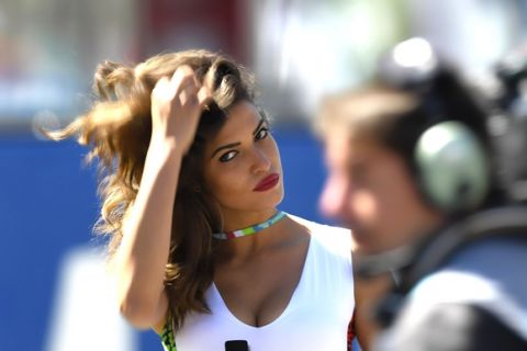 SCARPERIA, ITALY - MAY 22: A grid girl looks on on the grid during the MotoGP race during MotoGp of Italy - Race at Mugello Circuit on May 22, 2016 in Scarperia, Italy.  (Photo by Mirco Lazzari gp/Getty Images)
