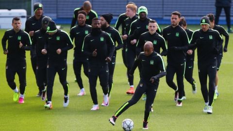 "MANCHESTER, ENGLAND - APRIL 25:  Fabian Delph leads the warm up during a Manchester City training session on the eve of their UEFA Champions League semi final first leg match against Real Madrid at the Academy training ground on April 25, 2016 in Manchester, United Kingdom.  (Photo by Dave Thompson/Getty Images)"