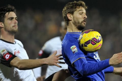 Cesena's Luka Krajnc, left, competes for the ball with Juventus' Fernando Llorente during their Serie A soccer match at Cesena's Manuzzi stadium, Italy, Sunday, Feb. 15, 2015. (AP Photo/Marco Vasini)