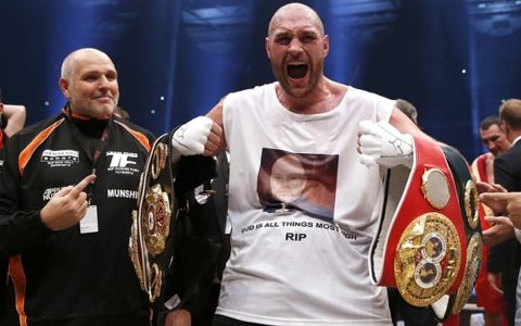 Boxing - Wladimir Klitschko v Tyson Fury WBA, IBF & WBO Heavyweight Title's - Esprit Arena, Dusseldorf, Germany - 28/11/15
 Tyson Fury celebrates winning the fight with his uncle and trainer Peter Fury 
 Action Images via Reuters / Lee Smith
 Livepic