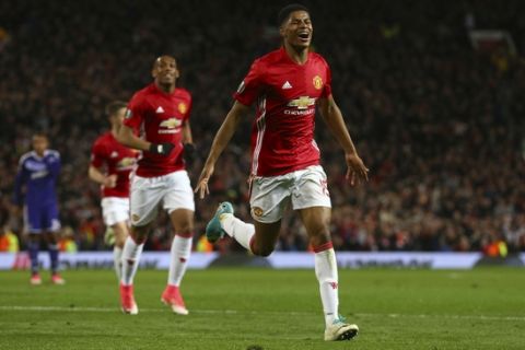 Manchester United's Marcus Rashford celebrates scoring his side's second goal during the Europa League quarterfinal second leg soccer match between Manchester United and Anderlecht at Old Trafford stadium, in Manchester, England, Thursday, April 20, 2017. (AP Photo/Dave Thompson)