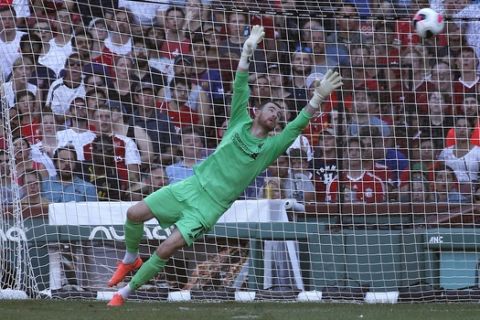 Liverpool goalie Andy Longergan is unable to make the save on a goal by Sevilla's Aguido Duran Manuel during the first half of a friendly soccer game at Fenway Park, Sunday, July 21, 2019, in Boston. (AP Photo/Mary Schwalm)
