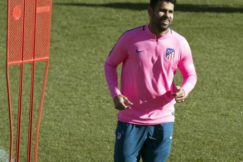 Atletico Madrid's Diego Costa attends a training session in Madrid, Spain, Tuesday Nov. 21, 2017. Atletico will play Roma Wednesday in a Group C Champions League soccer match. (AP Photo/Paul White)