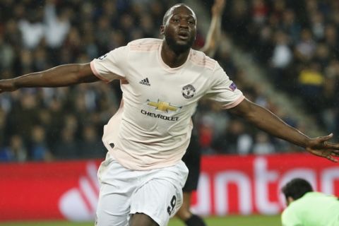 Manchester United's Romelu Lukaku celebrates after scoring his side's second goal during the Champions League round of 16, 2nd leg, soccer match between Paris Saint Germain and Manchester United at the Parc des Princes stadium in Paris, France, Wednesday, March. 6, 2019. (AP Photo/Thibault Camus)