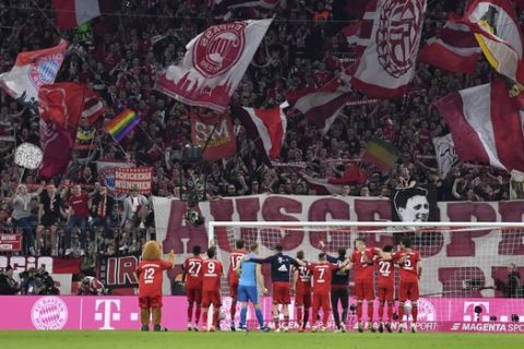 Bayern players celebrate their win after the German Bundesliga soccer match between FC Bayern Munich and Borussia Dortmund in the Allianz Arena in Munich, Germany, on Saturday, April 6, 2019. Bayern won 5-0. (AP Photo/Kerstin Joensson)