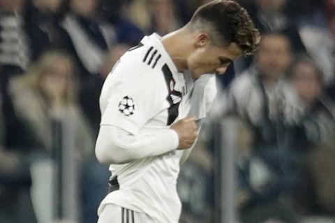 Juventus' Cristiano Ronaldo walks off the pitch at the end of the Champions League, quarterfinal, second leg soccer match between Juventus and Ajax, at the Allianz stadium in Turin, Italy, Tuesday, April 16, 2019. Ajax won 2-1 and advances to the semifinal on a 3-2 aggregate. (AP Photo/Luca Bruno)