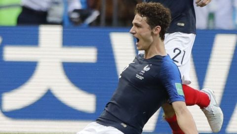 France's Benjamin Pavard, bottom, celebrates after scoring his side's second goal with teammate France's Lucas Hernandez, top, during the round of 16 match between France and Argentina, at the 2018 soccer World Cup at the Kazan Arena in Kazan, Russia, Thursday, June 28, 2018. (AP Photo/Ricardo Mazalan)