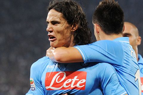 NAPLES, ITALY - SEPTEMBER 18:  Edinson Cavani of Napoli celebrates after scoring the  goal  1-1 during the Serie A match between SSC Napoli and AC Milan at Stadio San Paolo on September 18, 2011 in Naples, Italy.  (Photo by Giuseppe Bellini/Getty Images)