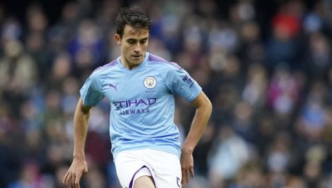 Manchester City's Eric Garcia kicks the ball during an English FA Cup fourth round soccer match between Manchester City and Fulham at the Etihad Stadium in Manchester, England, Sunday, Jan. 26, 2020. (AP Photo/Jon Super)