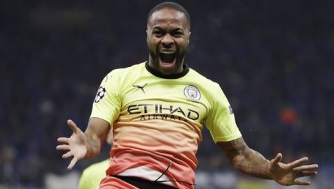 Manchester City's Raheem Sterling celebrates after scoring his side's opening goal during the Champions League group C soccer match between Atalanta and Manchester City at the San Siro stadium in Milan, Italy, Wednesday, Nov. 6, 2019. (AP Photo/Luca Bruno)