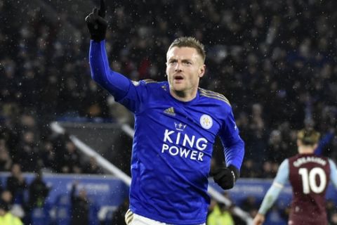 Leicester's Jamie Vardy celebrates after scoring his side's third goal during the English Premier League soccer match between Leicester City and Aston Villa at the King Power Stadium, in Leicester, England, Monday, March 9, 2020. (AP Photo/Rui Vieira)