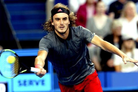 Stefanos Tsitsipas of Greece plays a shot during his match against Switzerland's Roger Federer at the Hopman Cup in Perth, Australia, Thursday Jan. 3, 2019. (AP Photo/Trevor Collens)