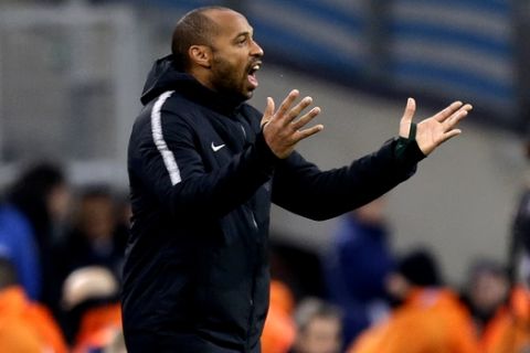 FILE - In this Sunday, Jan. 13, 2019 file photo, Monaco coach Thierry Henry gives instructions during the League One soccer match between Marseille and Monaco at the Velodrome stadium, in Marseille, southern France.  Henry is facing an anxious wait while his Monaco future is decided, with the club battling to avoid relegation amid rising tensions between Henry and players in the squad, it was reported on Thursday, Jan. 24, 2019. (AP Photo/Claude Paris, File)