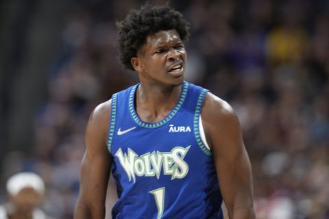 Minnesota Timberwolves forward Anthony Edwards (1) in the second half of an NBA basketball game Friday, April 1, 2022, in Denver. (AP Photo/David Zalubowski)