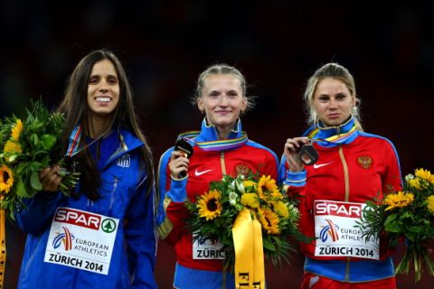 ZURICH, SWITZERLAND - AUGUST 14:  Gold medalist Anzhelika Sidorova (C) of Russia, silver medalist Ekaterini Stefanidi (L) of Greece and bronze medalist Angelina Zhuk-Krasnova of Russia pose with their medals on the podium during the medal ceremony for the Women's Pole Vault final during day three of the 22nd European Athletics Championships at Stadium Letzigrund on August 14, 2014 in Zurich, Switzerland.  (Photo by Michael Steele/Getty Images)