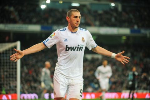 MADRID, SPAIN - MARCH 03:  Karim Benzema of Real Madrid celebrates after scoring Real''s first goal during the La Liga match bewteen Real Madrid and Malaga at Estadio Santiago Bernabeu on March 3, 2011 in Madrid, Spain.  (Photo by Denis Doyle/Getty Images)