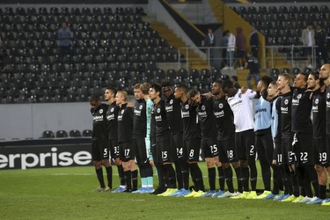 Eintracht Frankfurt players greet supporters at the end of the Europa League group F soccer match between Vitoria SC and Eintracht Frankfurt at the D. Afonso Henriques stadium in Guimaraes, Portugal, Thursday, Oct. 3, 2019. (AP Photo/Luis Vieira)