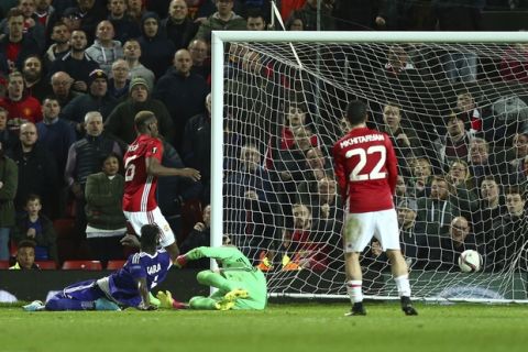 Manchester United's Paul Pogba, top left, has a goal disallowed during the Europa League quarterfinal second leg soccer match between Manchester United and Anderlecht at Old Trafford stadium, in Manchester, England, Thursday, April 20, 2017. (AP Photo/Dave Thompson)