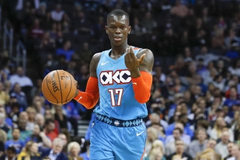 Oklahoma City Thunder guard Dennis Schroder (17) gestures as he goes down court against the Atlanta Hawks during the second half of an NBA basketball game in Oklahoma City, Friday, Nov. 30, 2018. Oklahoma City won 124-109. (AP Photo/Alonzo Adams)