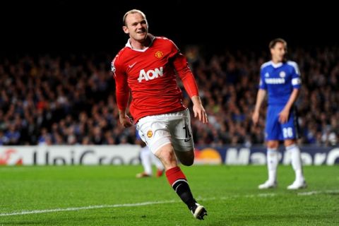 LONDON, ENGLAND - APRIL 06:  Wayne Rooney of Manchester United celebrates after scoring the opening goal during the UEFA Champions League quarter final first leg match between Chelsea and Manchester United at Stamford Bridge on April 6, 2011 in London, England.  (Photo by Mike Hewitt/Getty Images)