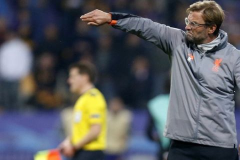 Liverpool coach Jurgen Klopp gives directions to his players during the Champions League soccer match between Maribor and Liverpool at the Ljudski vrt stadium, in Maribor, Slovenia, Tuesday, Oct. 17, 2017. (AP Photo/Darko Bandic)