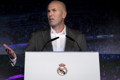 Newly appointed Real Madrid head coach Zinedine Zidane speaks during a press conference in Madrid, Monday March 11, 2019. Real Madrid picked one of its most successful coaches to try to end one of its worst crises. Zidane is returning to coach Real Madrid, the club he led to three straight Champions League titles. (AP Photo/Bernat Armangue)