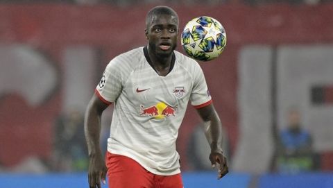 Leipzig's Dayot Upamecano during the Champions League group G soccer match between RB Leipzig and Zenit St. Petersburg in Leipzig, Germany, Wednesday, Oct. 23, 2019. (AP Photo/Jens Meyer)