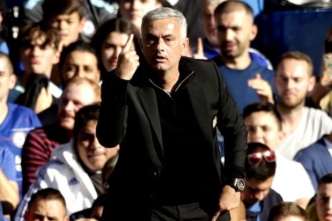 ManU coach Jose Mourinho gestures during their English Premier League soccer match between Chelsea and Manchester United at Stamford Bridge stadium in London Saturday, Oct. 20, 2018. (AP Photo/Matt Dunham)