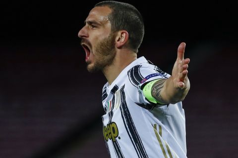 Juventus' Leonardo Bonucci gestures during the Champions League group G soccer match between FC Barcelona and Juventus at the Camp Nou stadium in Barcelona, Spain, Tuesday, Dec. 8, 2020. (AP Photo/Joan Monfort)
