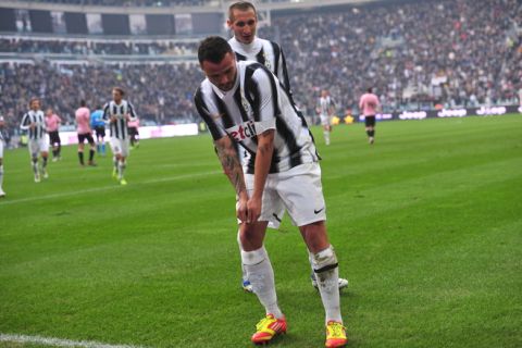 Juventus' midfielder Simone Pepe (front) celebrates with defender Giorgio Chiellini after scoring a goal during the Serie A football match between Juventus and Palermo at the "Juventus Stadium" in Turin on November 20, 2011. AFP PHOTO / GIUSEPPE CACACE (Photo credit should read GIUSEPPE CACACE/AFP/Getty Images)